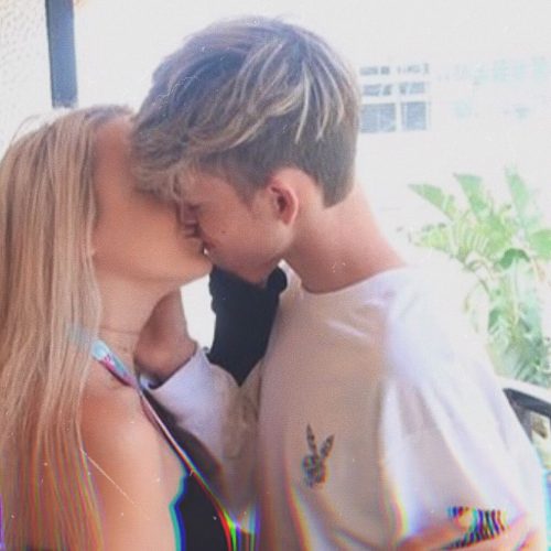 Zephan Clark and his girlfriend kissing each other