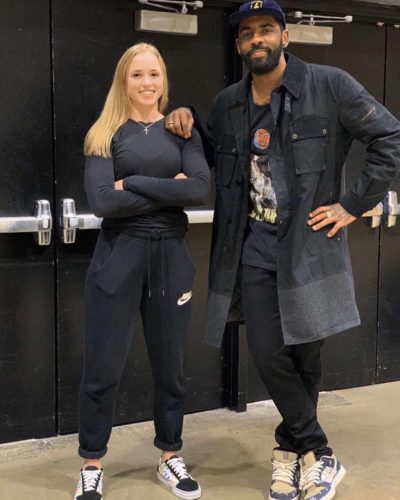 Hailey Van Lith with professional basketball player Kyrie Irving