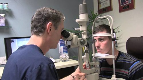 Brian Boxer Wachler conducting eye test