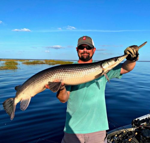 Stephen Russell holding a fish