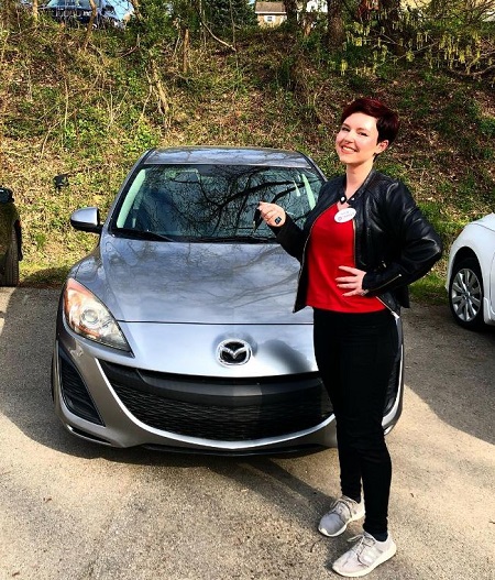 Aubrey with her new car bought on April 19, 2021