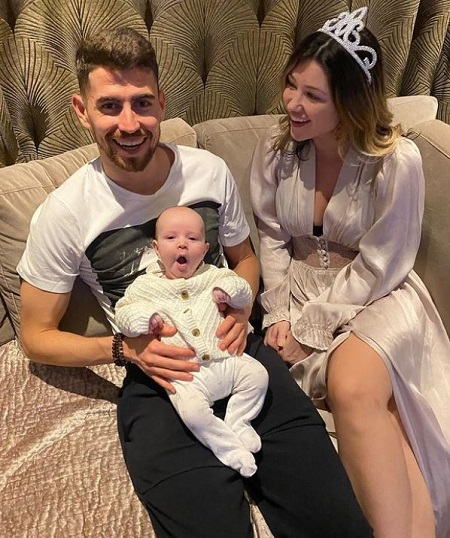 Catherine Harding with her boyfriend Jorginho Frello (professional footballer) and their son