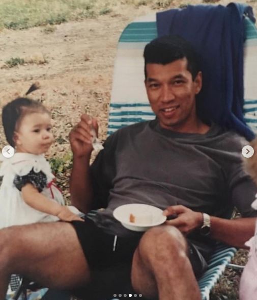 Childhood image of Julia Kelly with her father