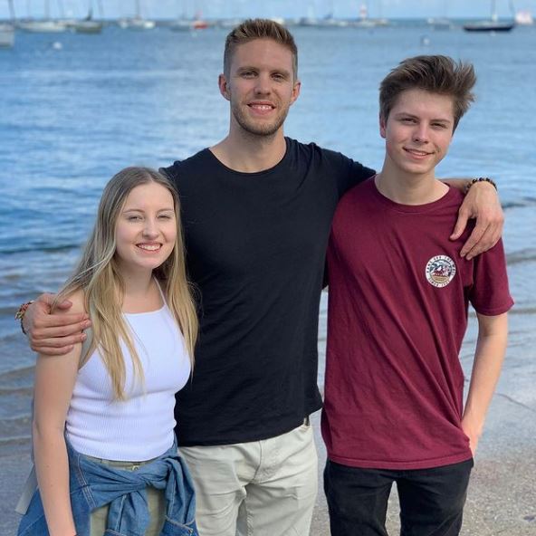 Chris Long with his siblings