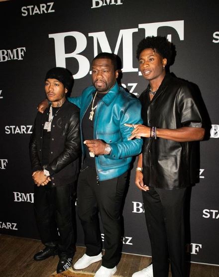 Demetrius Flenory Jr with 50 Cent at BMF promotion
