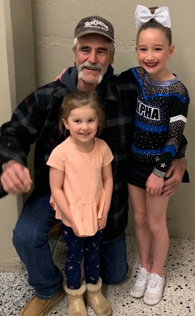 Forrie J Smith with his granddaughters