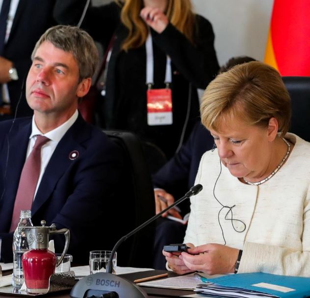 Jan Hecker and Angela Merkel