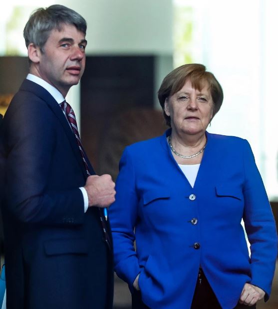 Jan Hecker worked as an advisor to Angela Merkel