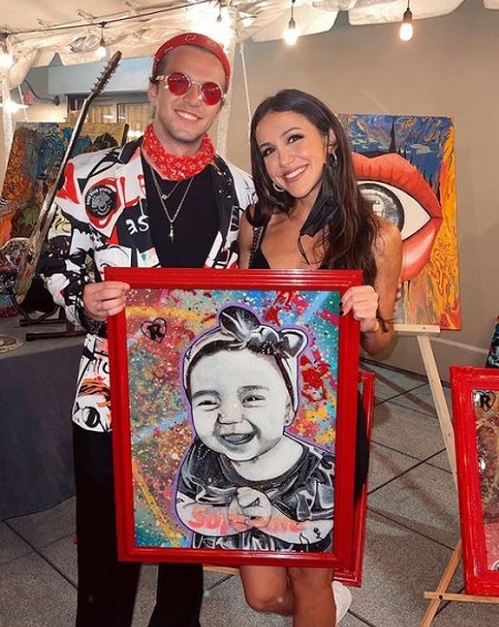 Kat Stickler with Rojo who drew her daughter's picture
