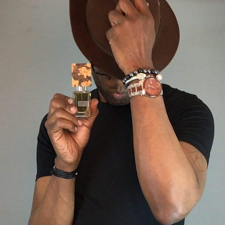 Kevin Samuels promoting a small fragrance brand