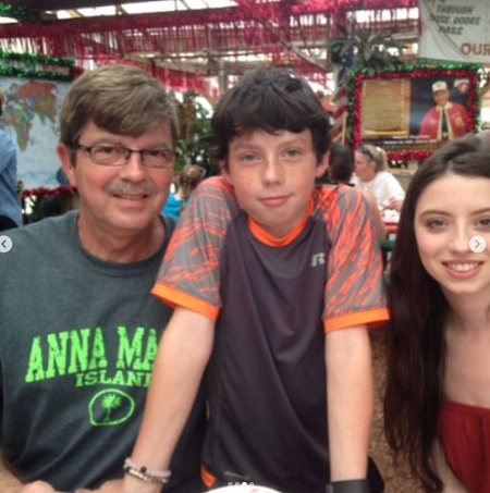 Leah Fennelly with her father and younger brother