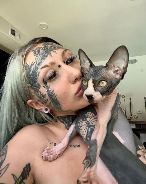 Orylan with her pet cat