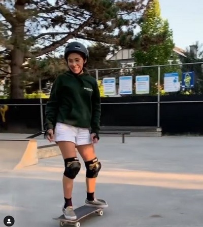 Xochitl Gomez skateboarding