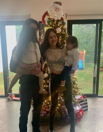 Zuria Vega with her husband daughter and son